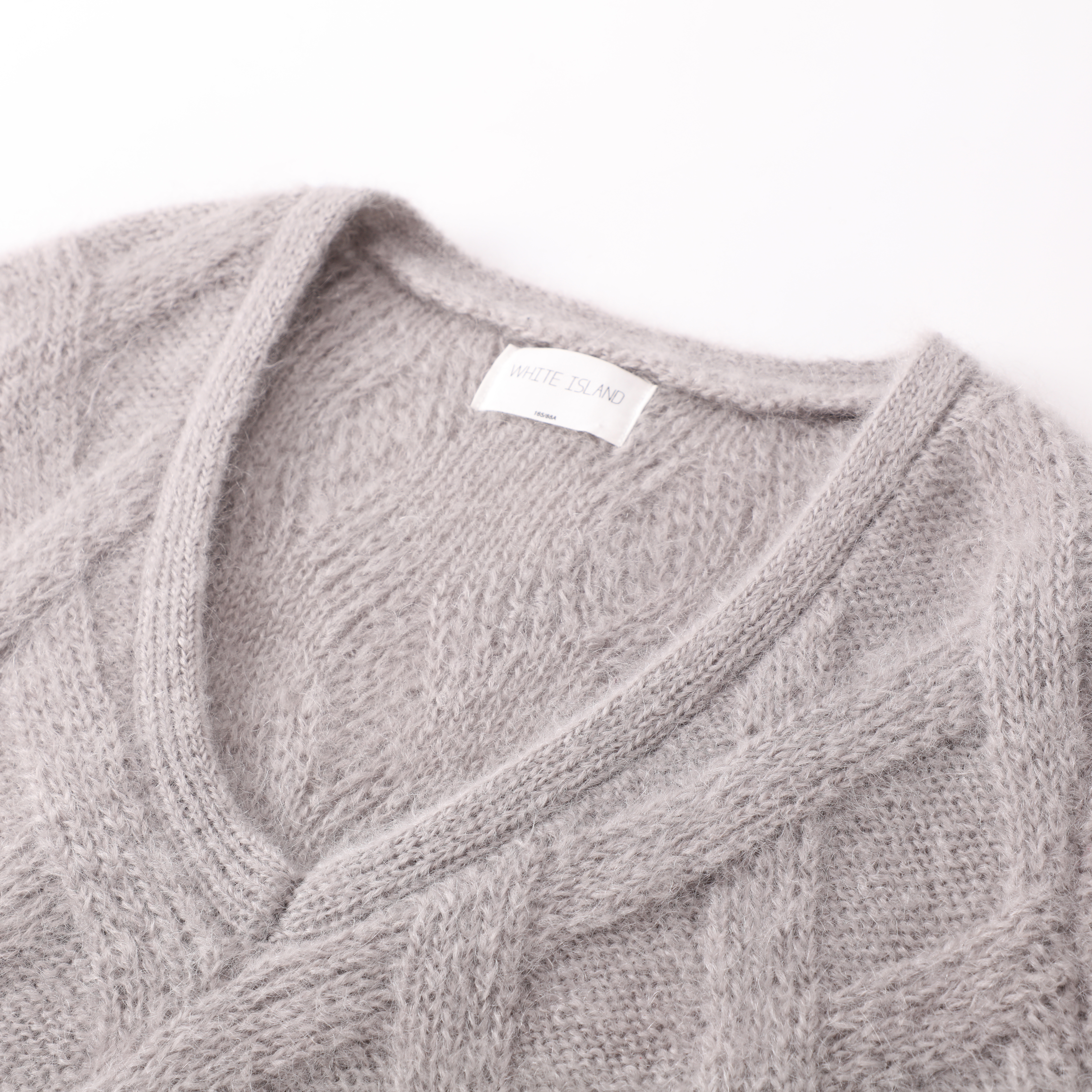 Otoño Invierno OEM fábrica moda nuevo personalizado manga larga lana cuello en V gris mujeres suéter de punto