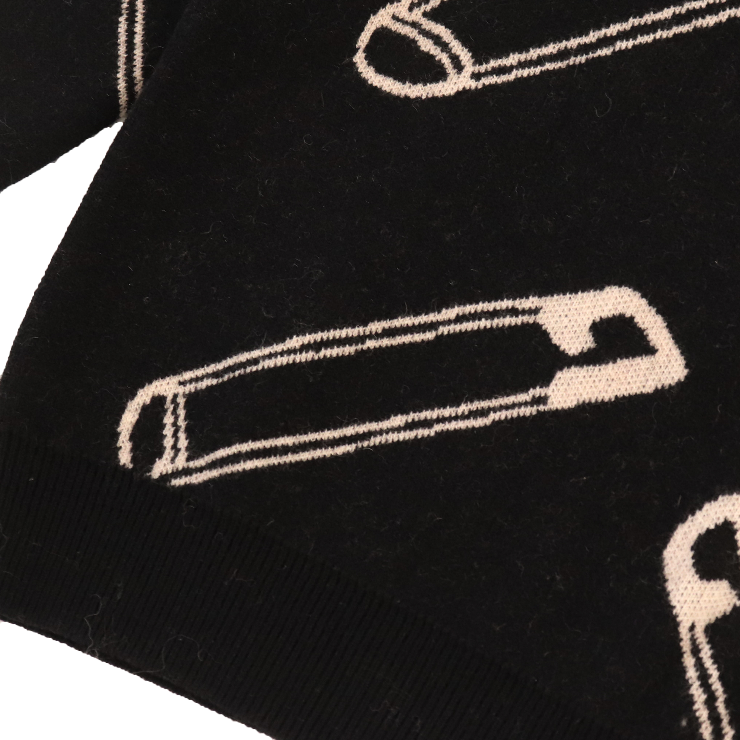 Suéter de punto de manga larga con estampado negro personalizado OEM de otoño invierno para mujer