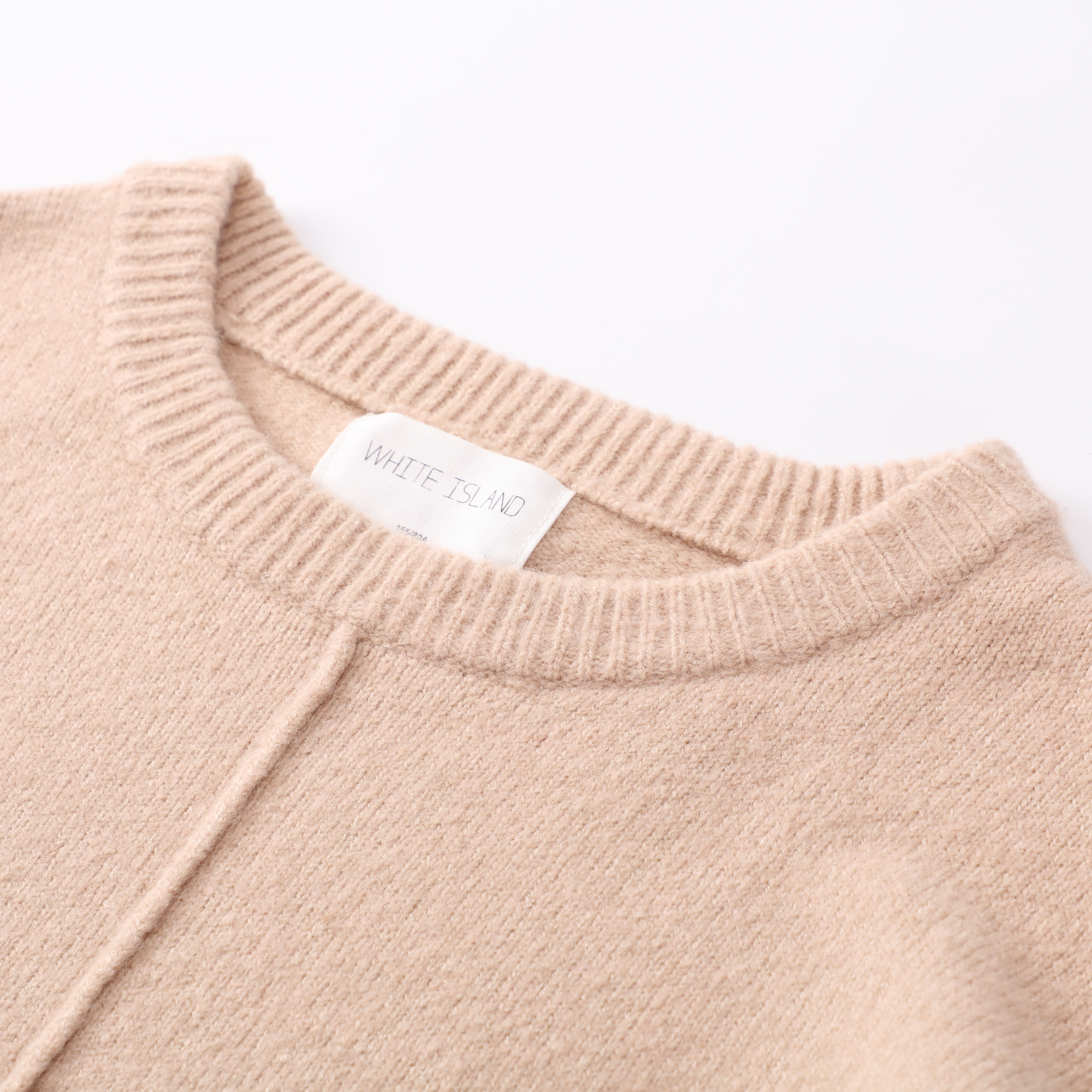 Suéter suelto de punto de manga larga beige personalizado OEM de otoño invierno para mujer